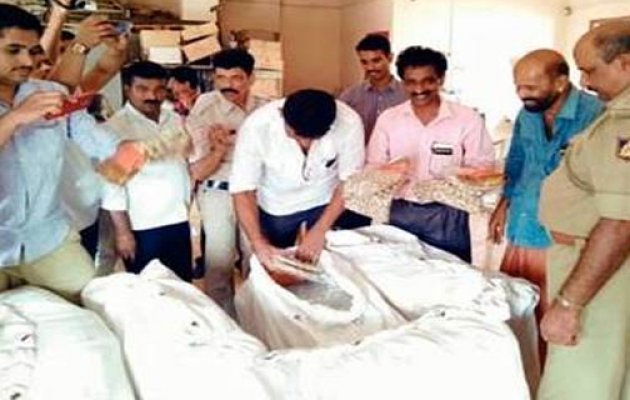 Election flying squad raids cooperative bank, 1,222 saris seized